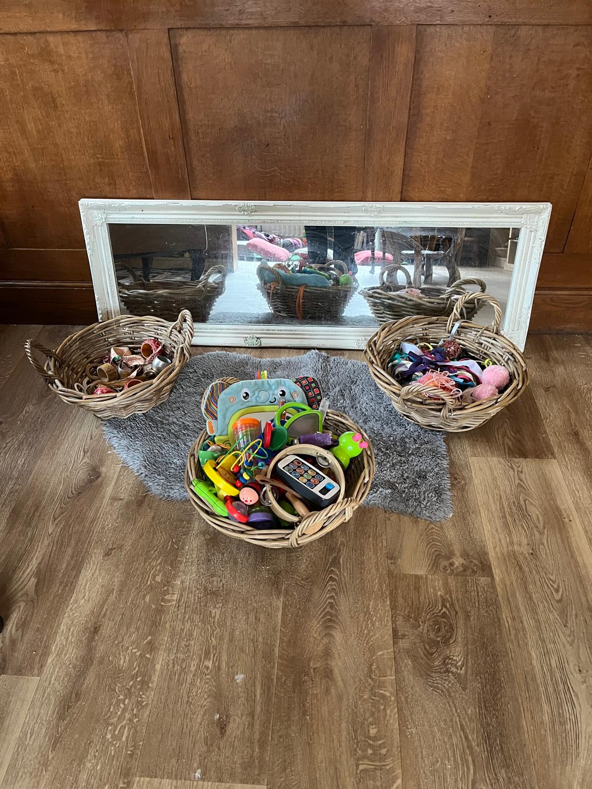 Natural resources and baskets in the Bumblebees baby room