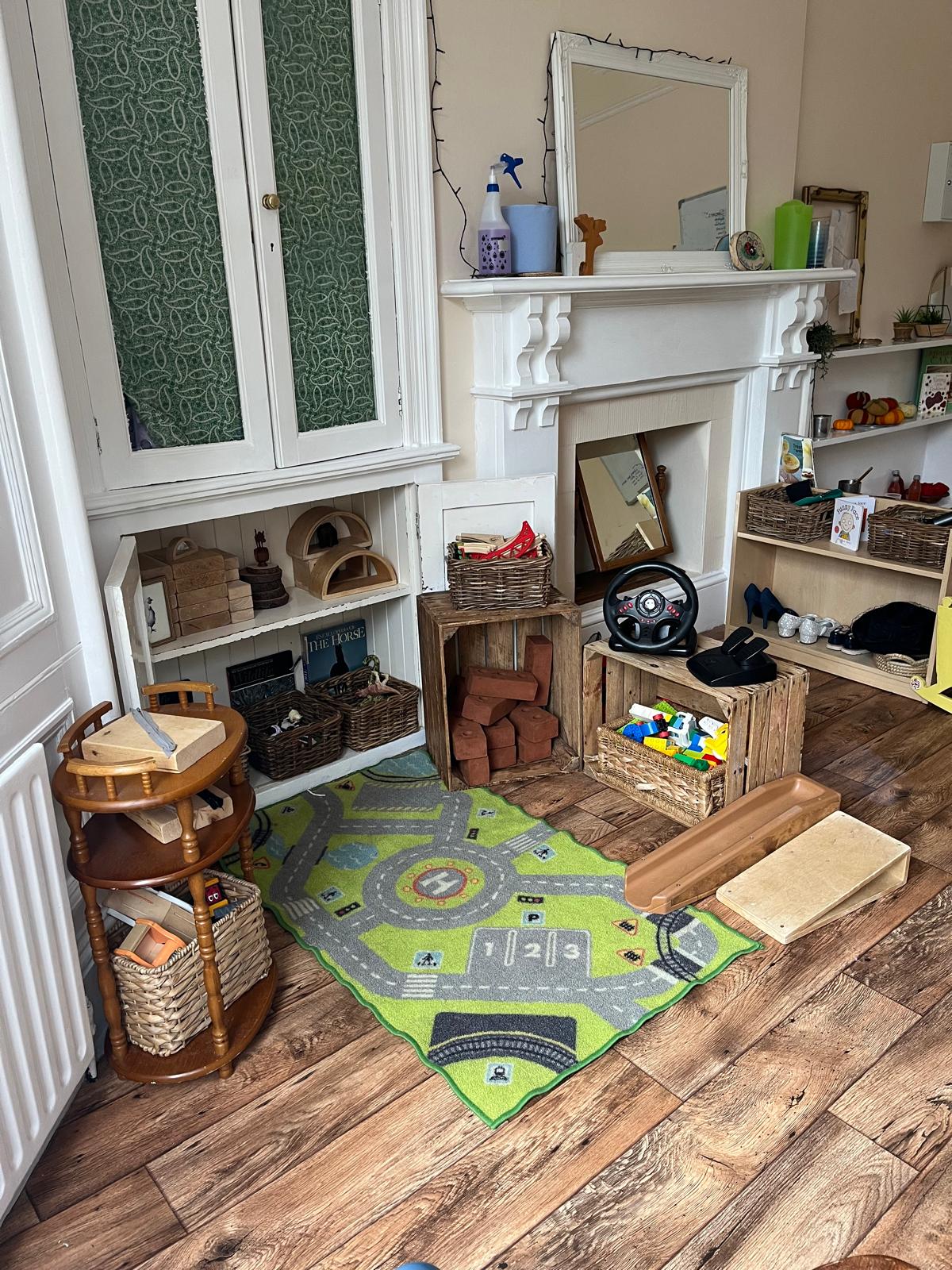 Small-world road-mat play in the Ladybirds toddler room