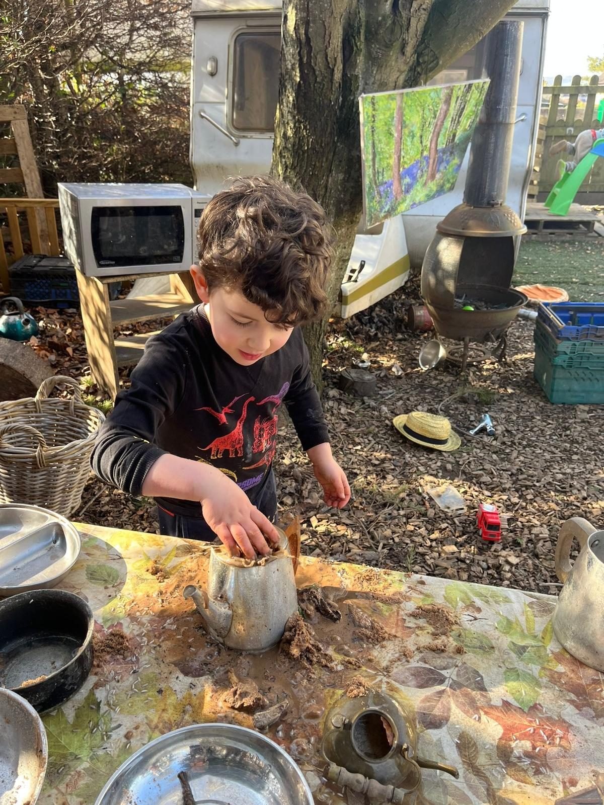 A child exploring the natural outdoor area
